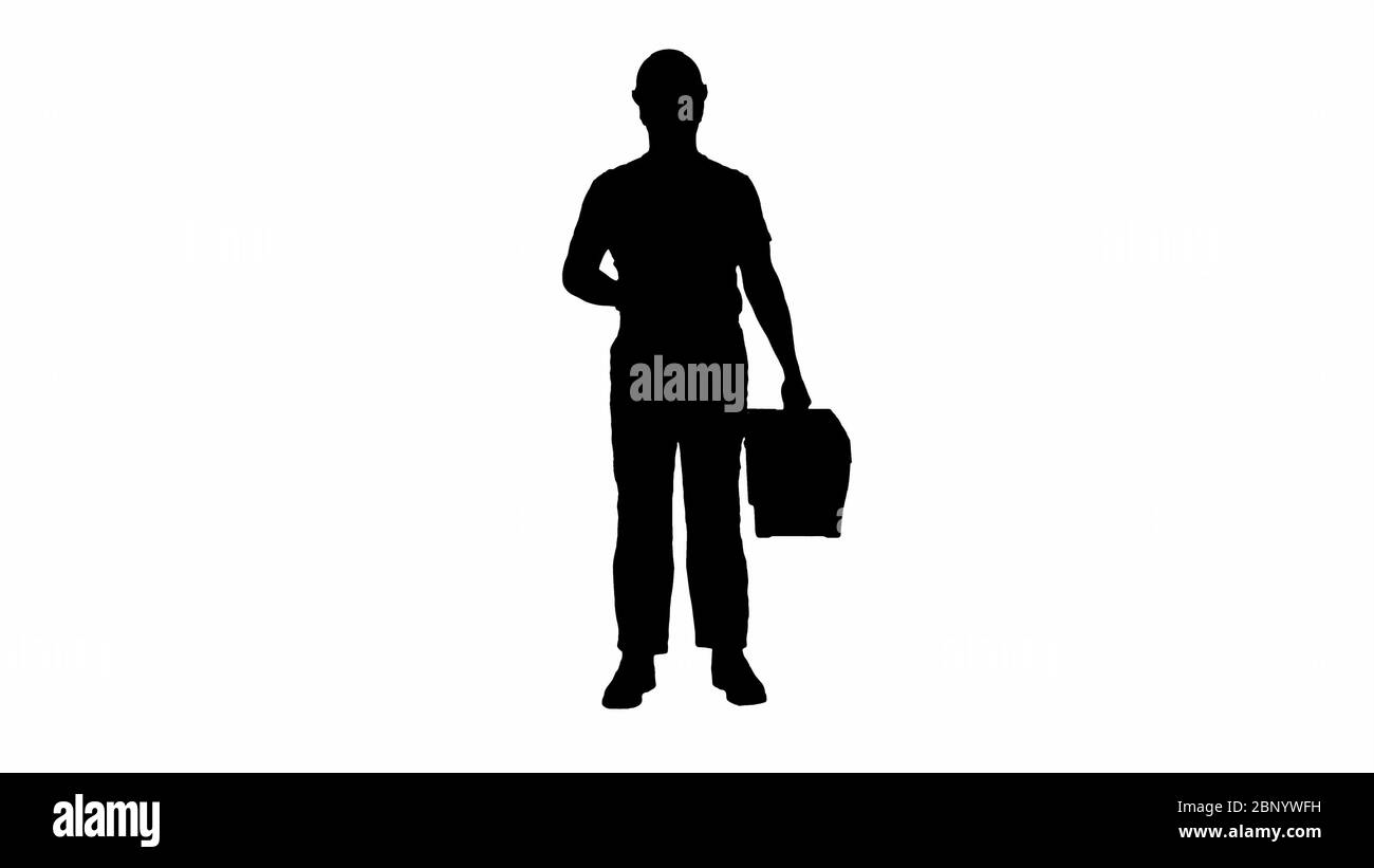 Silhouette A repairman holding a toolbox and wrench smiling to camera. Stock Photo