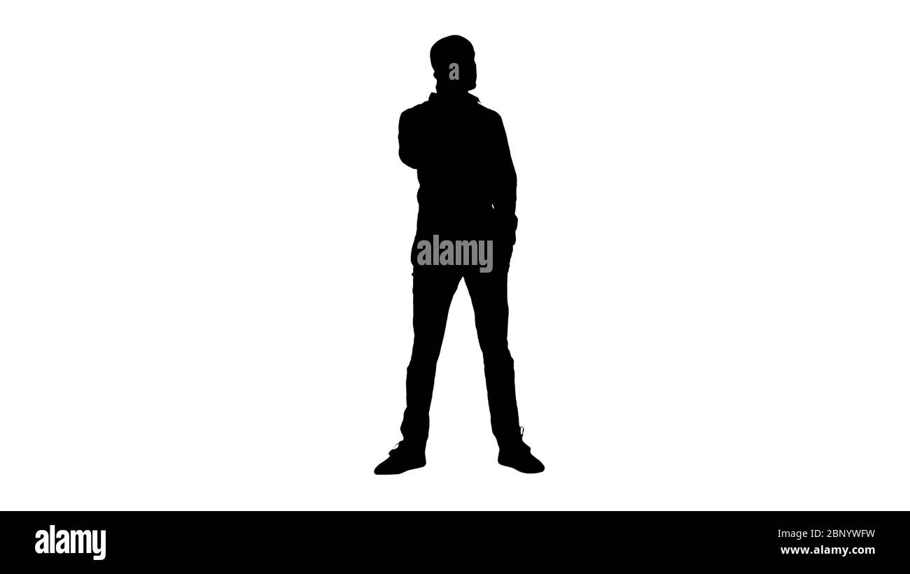 Silhouette Arabic man talking on the phone. Stock Photo