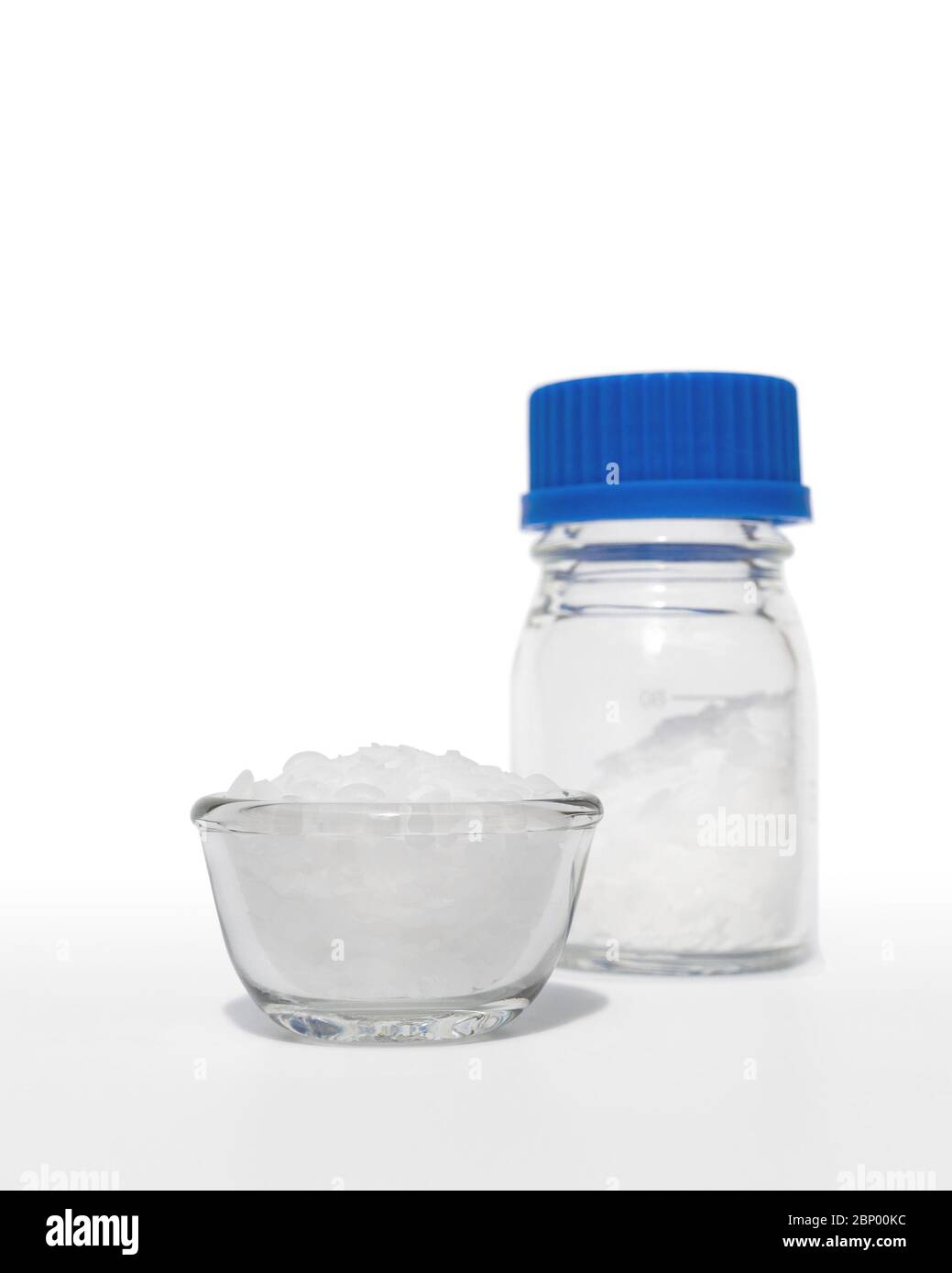 Close up White flake chemical on laboratory table. Cetyl esters wax