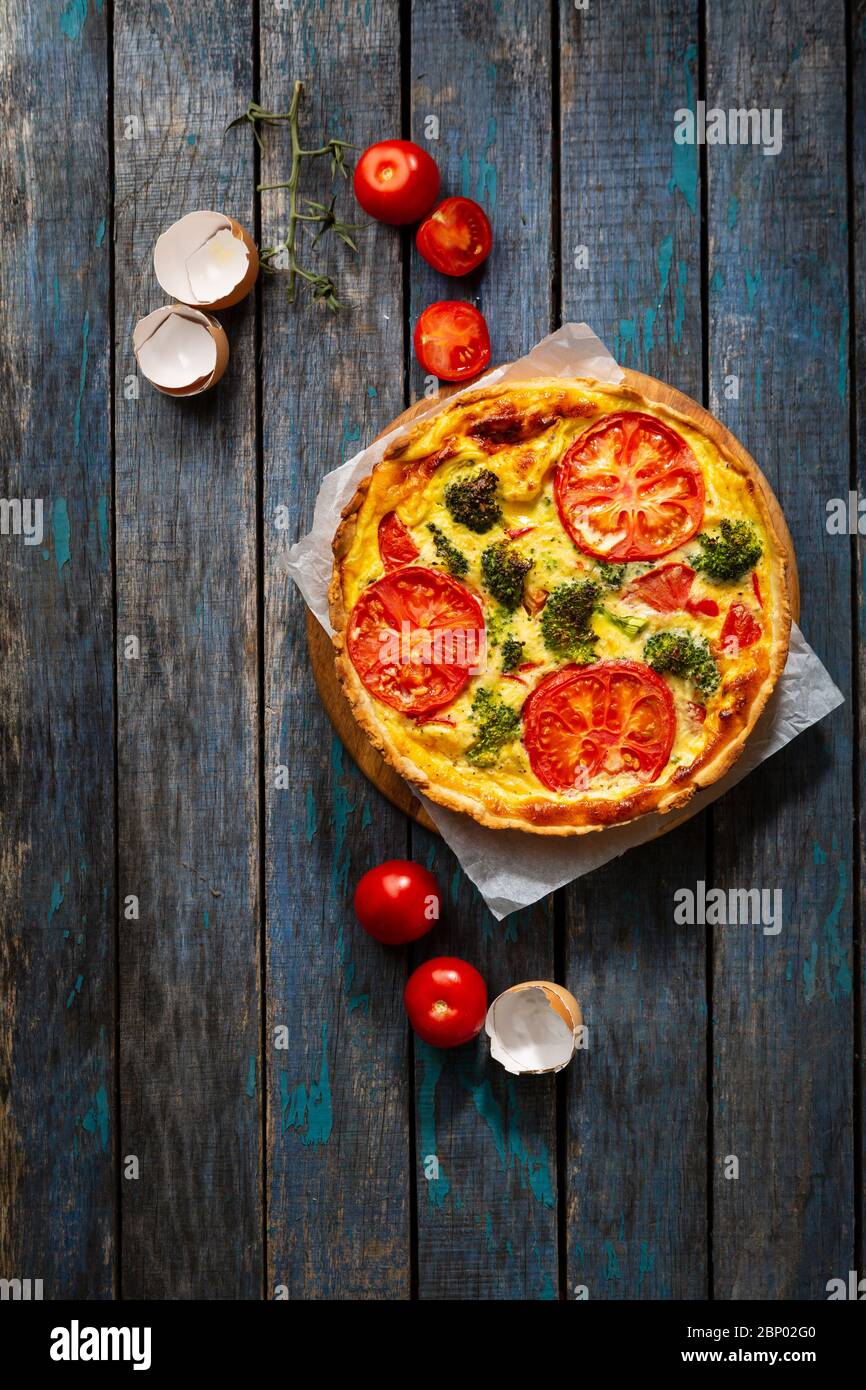 Cheesy Tomato Quiche for Brunch with Broccoli Stock Photo