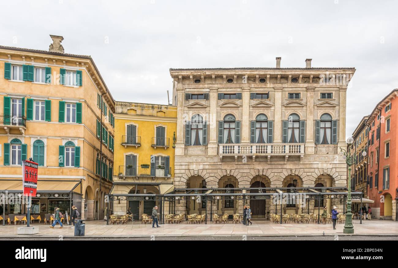 Verona historic center with large historic buildings. Piazza delle Erbe. Verona, Veneto Region, Northern Italy, Europe - March 9, 2016 Stock Photo