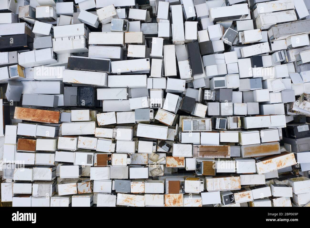Many old refrigerators awaiting recycling at a Waste Electrical and Electronic Equipment (WEEE) plant in Perth, Scotland, UK Stock Photo