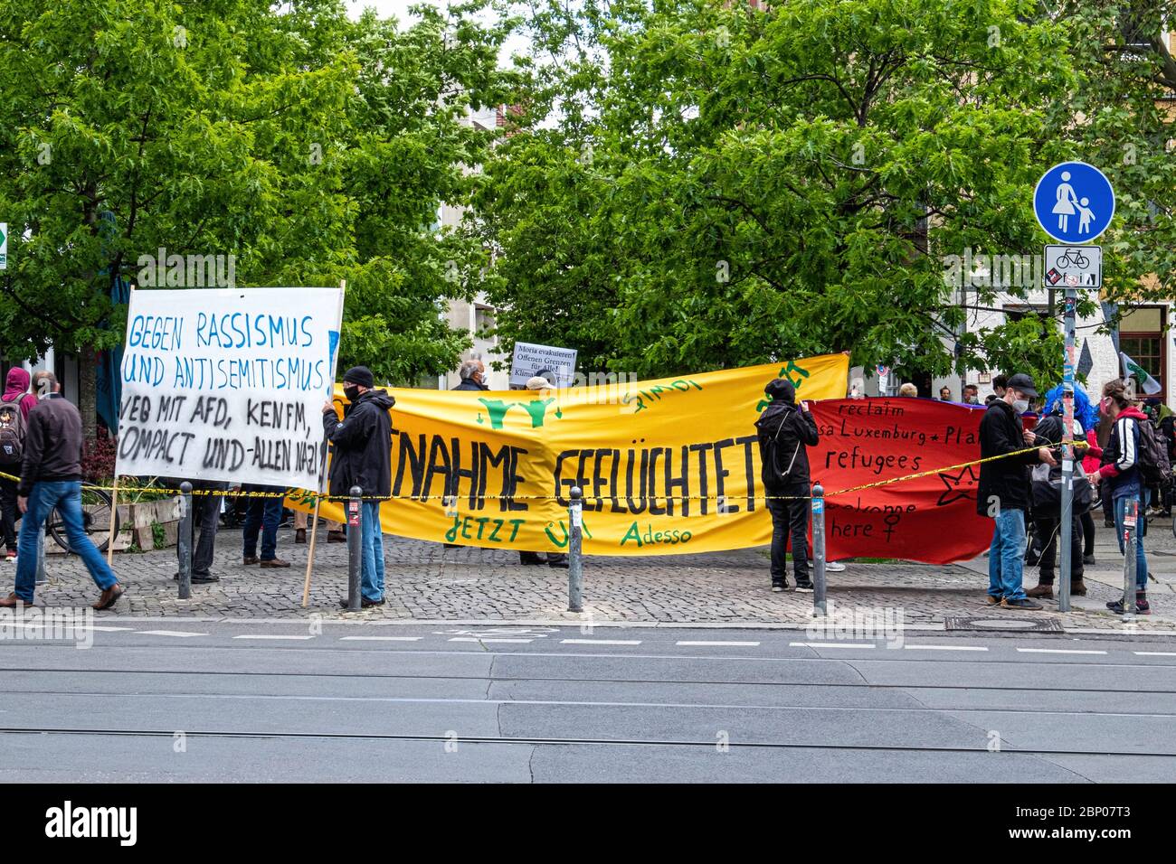 Mitte, Berlin, Germany. 16th May 2020 Small left wing demonstration opposing Racism during the COVID-19 pandemic. Demonstrators expressed anger that the Right wing Protesters were allowed a more prominent and larger area in front of the Volksbuhne theater. The Right and Left wing protests were contained by large numbers of police officers and several arrests were made. Stock Photo