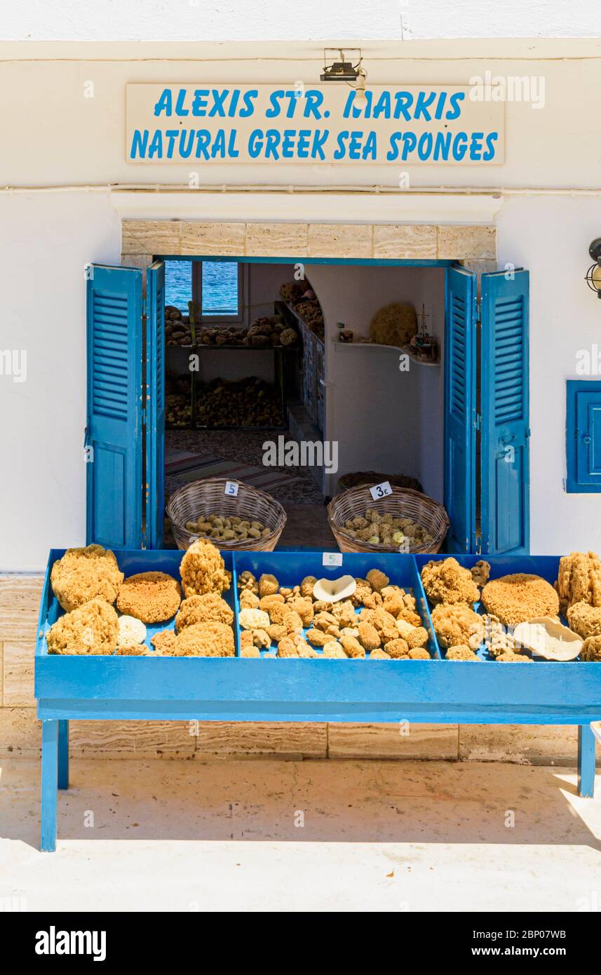 Kalymanian sponges for sale outside a shop in Mirties, Kalymnos, Dodecanese, Greece Stock Photo