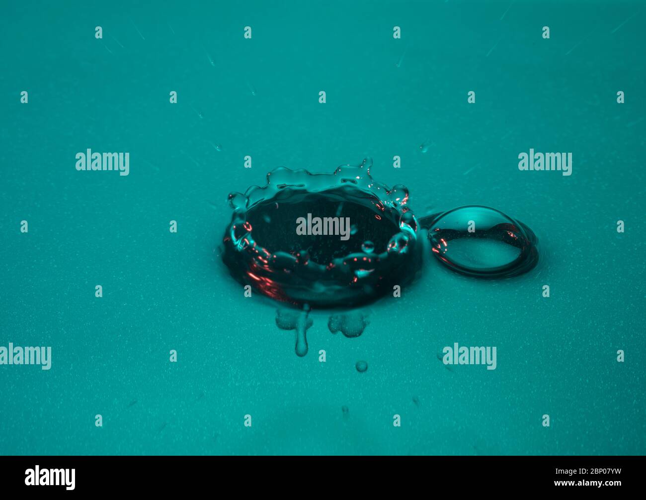 Craterlike impact of water droplet on liquid surface seen frozen at