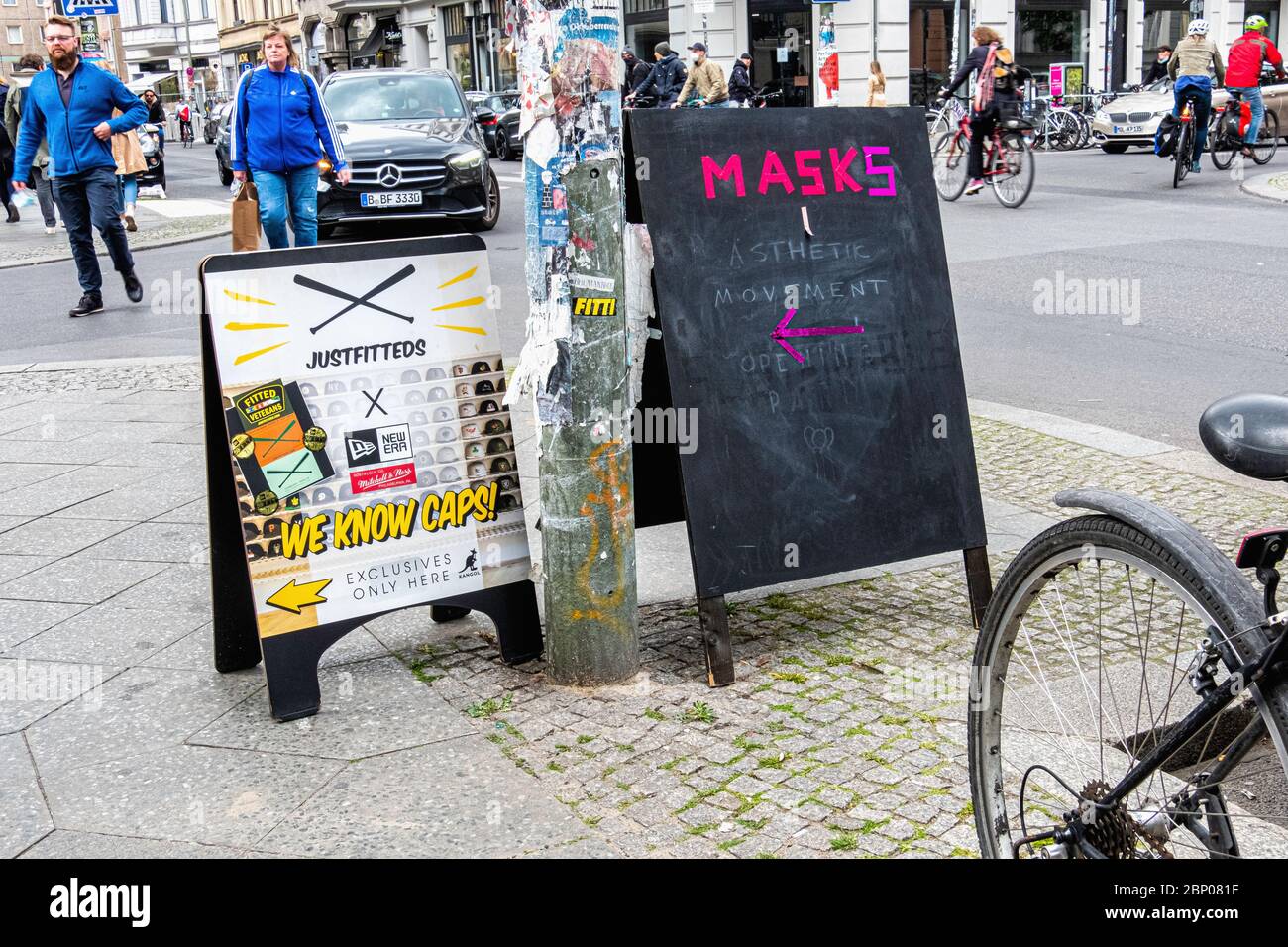 Mitte, Berlin, Germany. Board advertising face masks during the COVID