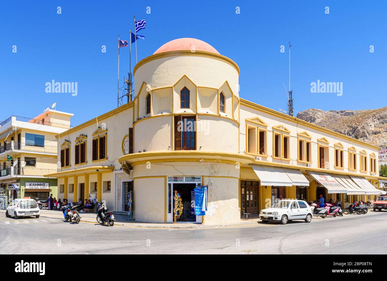 Italian designed domed civic building facade in Pothia Town, Kalymnos, Dodecanese, Greece Stock Photo