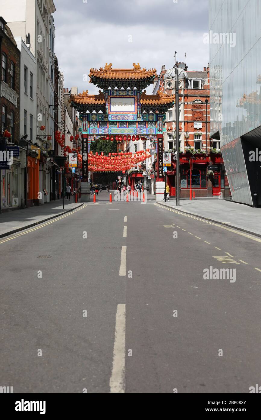 London, UK. 16th May, 2020. Day Fifty Four of Lockdown, in London. Chinatown with very few people around at lunchtime. This is the first weekend of a slight relaxing of lockdown in England as the message from the government is now 'stay alert' instead of 'stay at home'. Now you are able to go out more, play golf, go fishing, and visit garden centres, but social distancing measures should still be maintained. The country has been on lockdown due to the COVID-19 Coronavirus pandemic. COVID-19 Coronavirus lockdown, Peterborough, UK, on May 16, 2020 Credit: Paul Marriott/Alamy Live News Stock Photo