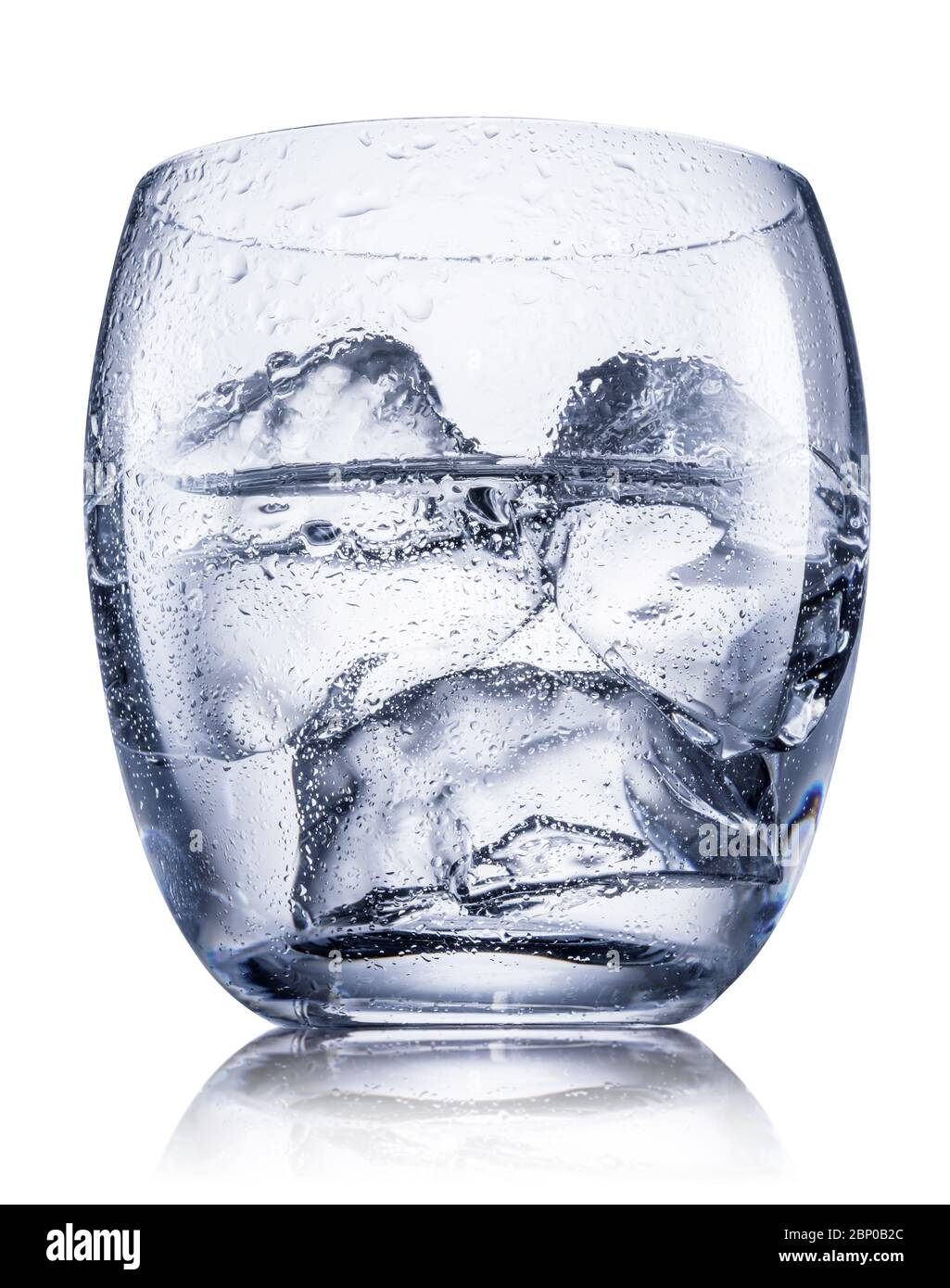 Glass of vodka or gin, chilled alcohol drink, with ice cubes isolated