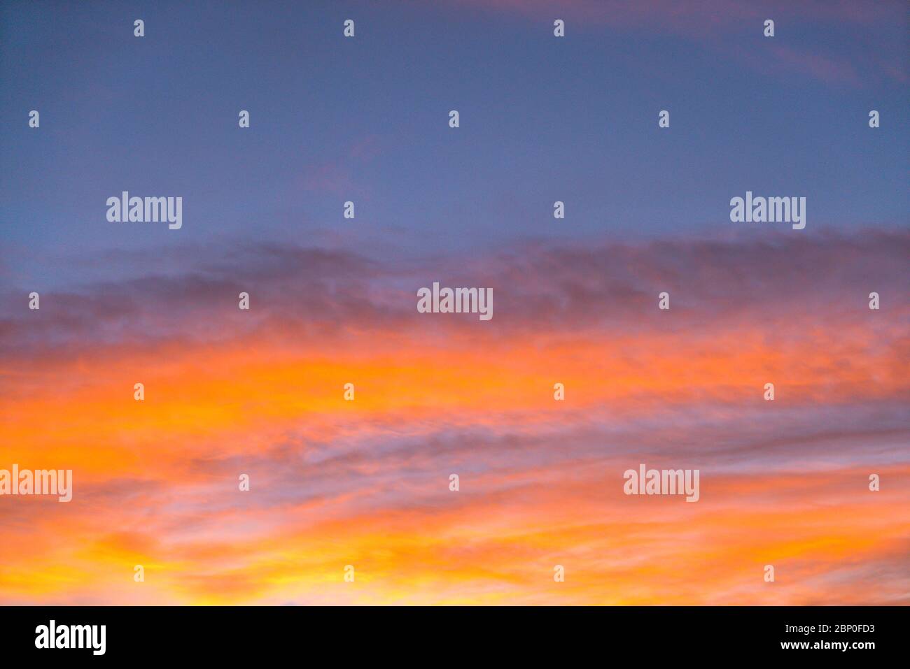 Dramatic sunset sky with orange colored clouds in summer season Stock ...