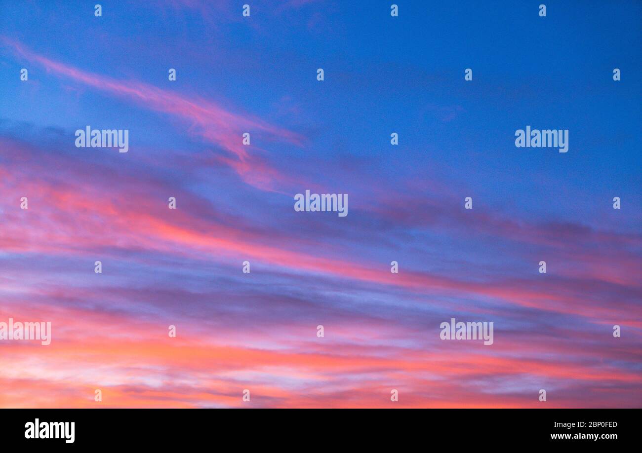 Dramatic sunset sky with orange colored clouds in summer season Stock ...