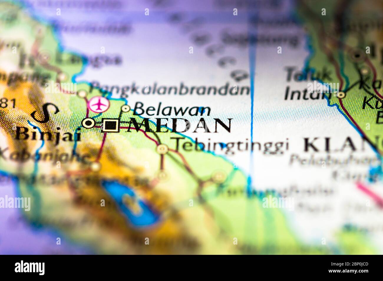 Shallow depth of field focus on geographical map location of Medan city in Indonesia Asia 