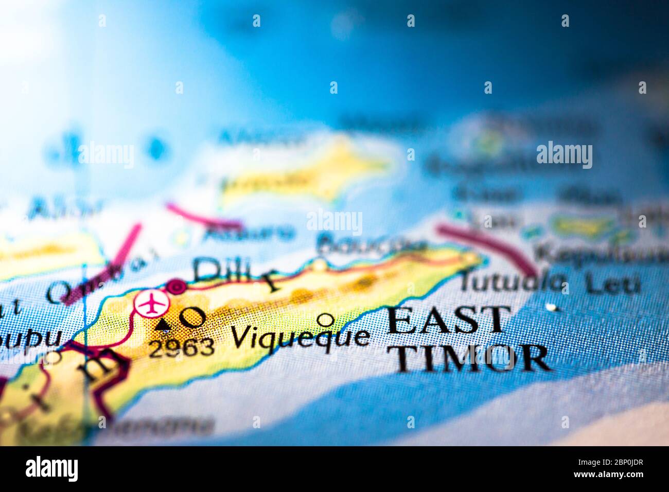 Shallow depth of field focus on geographical map location of East Timor Leste in Indonesia islands Asia continent on atlas Stock Photo