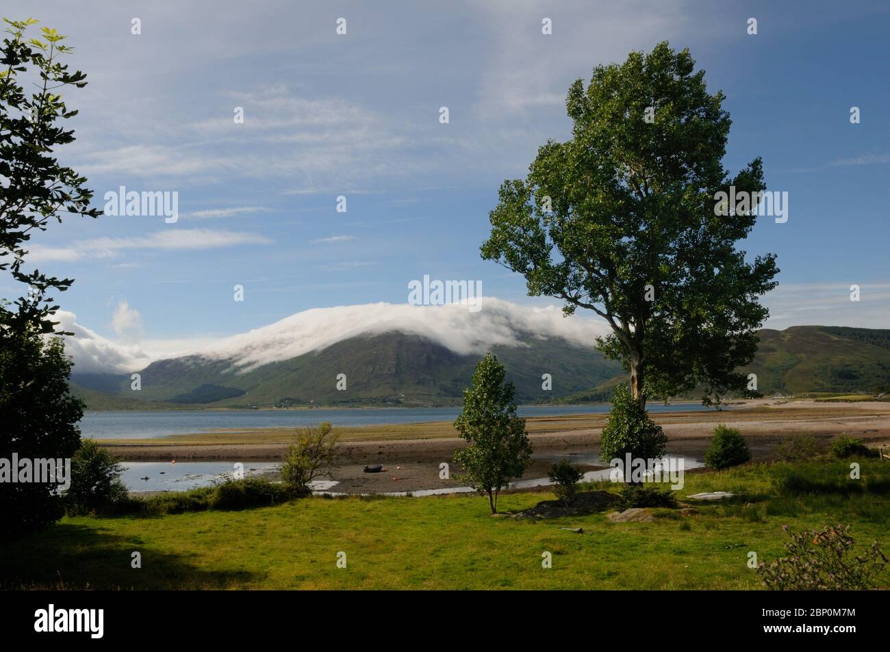 Mist-covered mountains on Skye seen from Glenelg looking over Kyle Rhea, Ross and Cromarty, Scotland Stock Photo