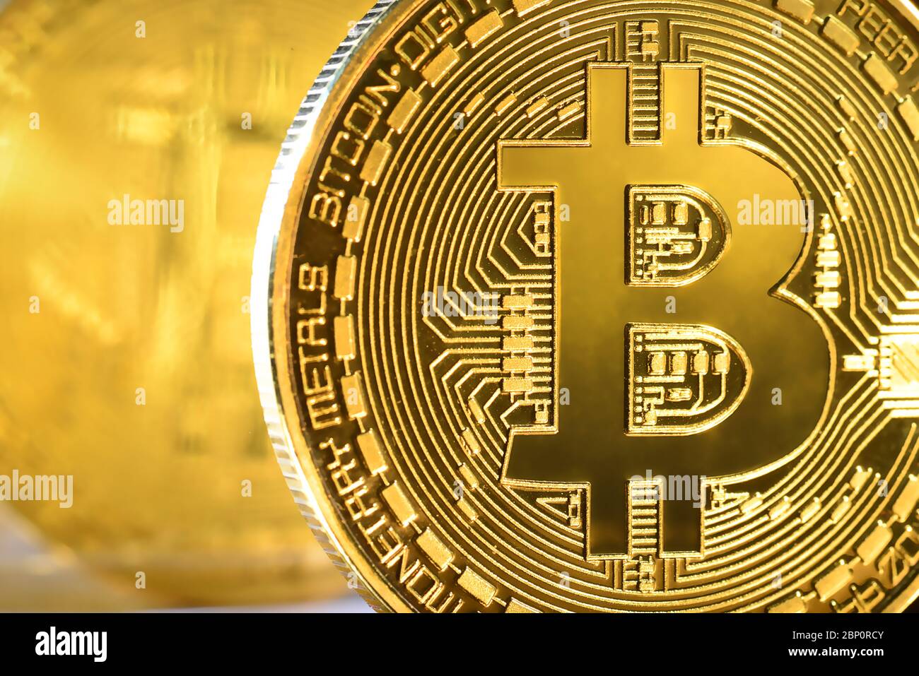 Crypto currency Golden Bitcoins on a gold background. Photo virtual money. Blockchain technology, bitcoin mining concept Stock Photo - Alamy