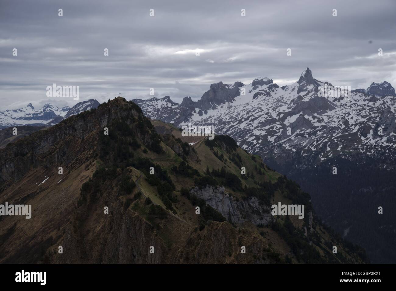 Panorama from Fronalpstock mountain peak overlooking Lake Lucerne and a typical swiss landscape with mountains and lakes. Stock Photo