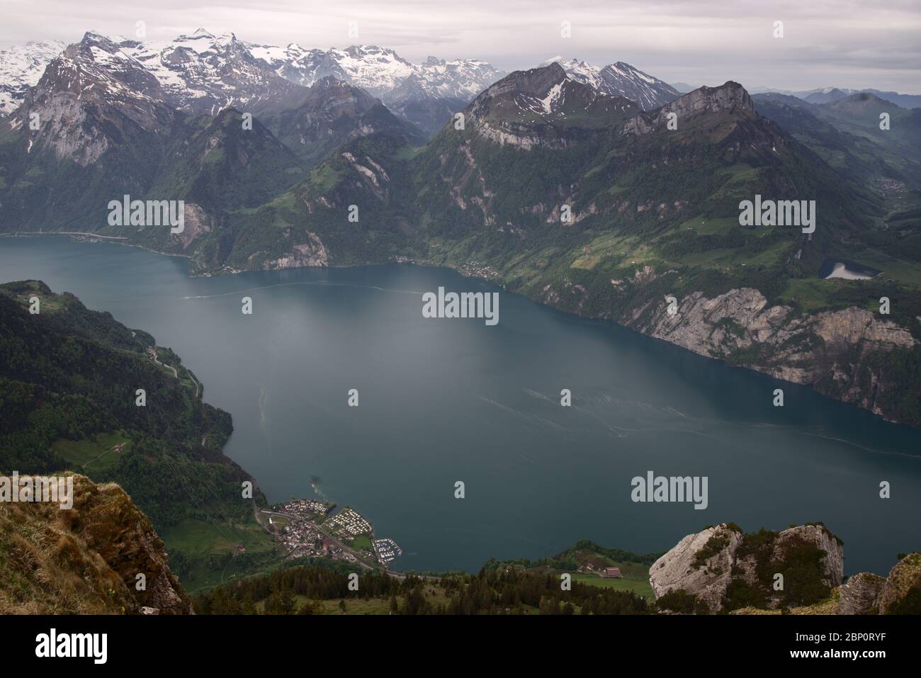Panorama from Fronalpstock mountain peak overlooking Lake Lucerne and a typical swiss landscape with mountains and lakes. Stock Photo