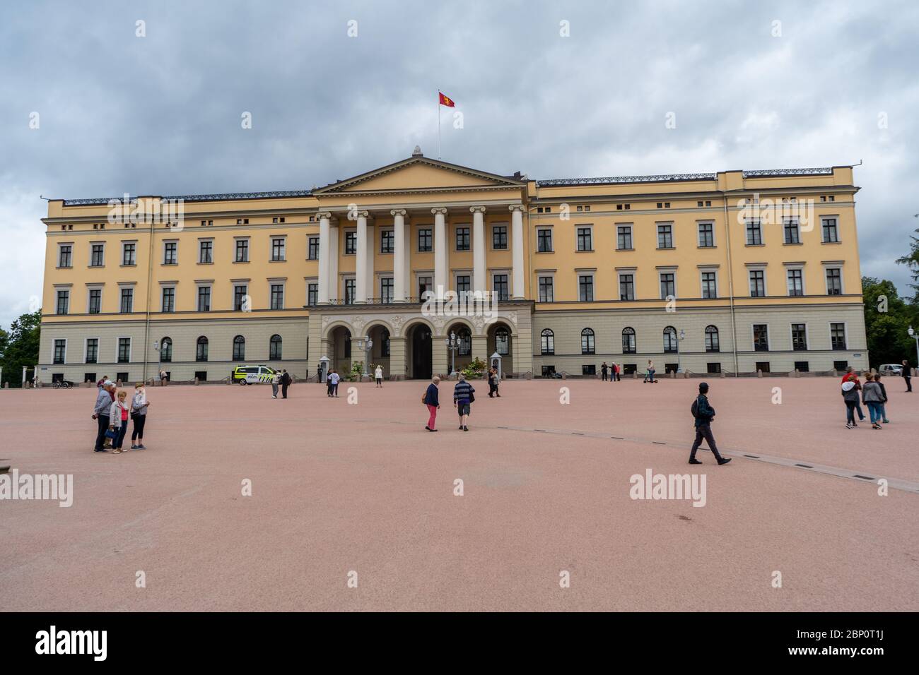 People walking around The Royal Palace of Oslo in Norway. August 2019 Stock Photo