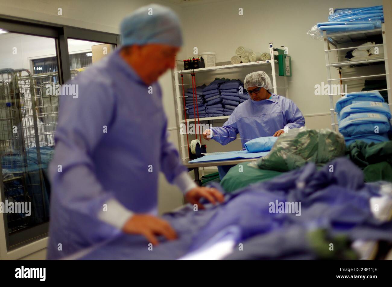 Reusable hospital gowns hires stock photography and images Alamy