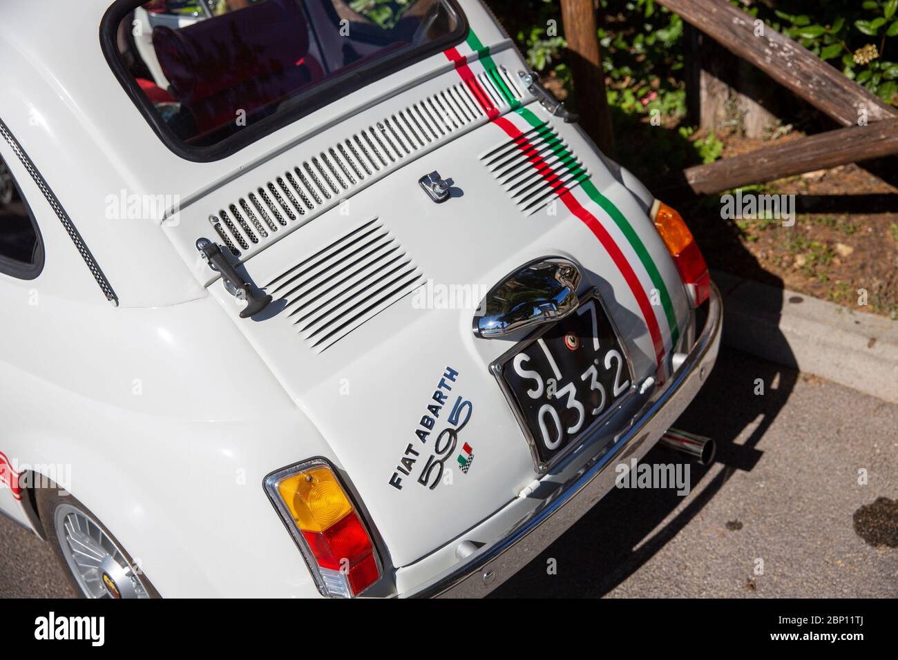 White Fiat Abarth 595 classic italian car racing in the  Coppa Del Chiant racing event in Chianti region of Tuscany,Italy Stock Photo