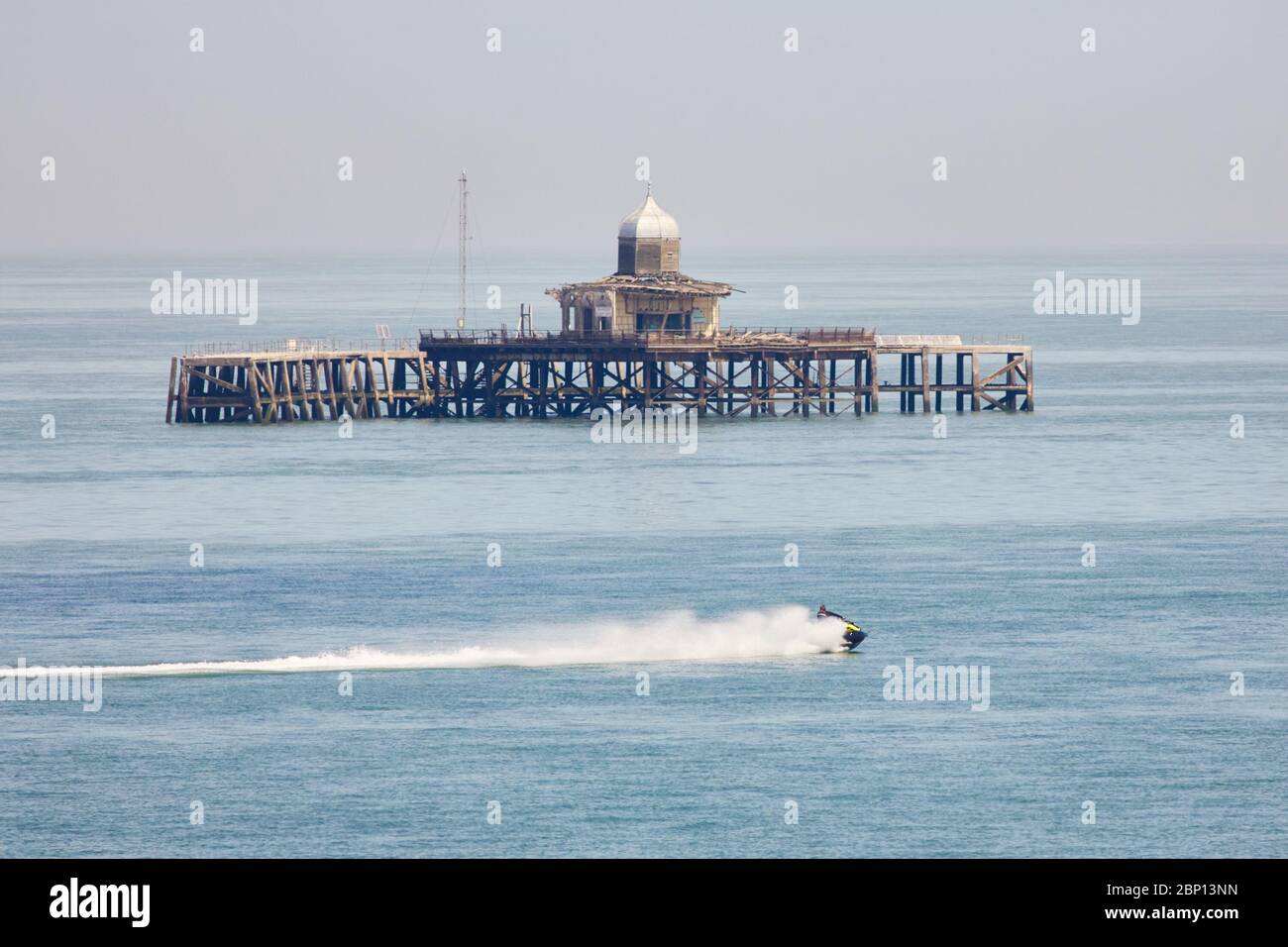 Herne Bay, Kent, UK. 17th May 2020: UK Weather. Jet Skiers take advantage of the sunshine and calm conditions to have fun around the abandoned old pier head at Herne Bay as restrictions on the lockdown are eased. The weather is set to remain good for the next few days. Credit: Alan Payton/Alamy Live News Stock Photo