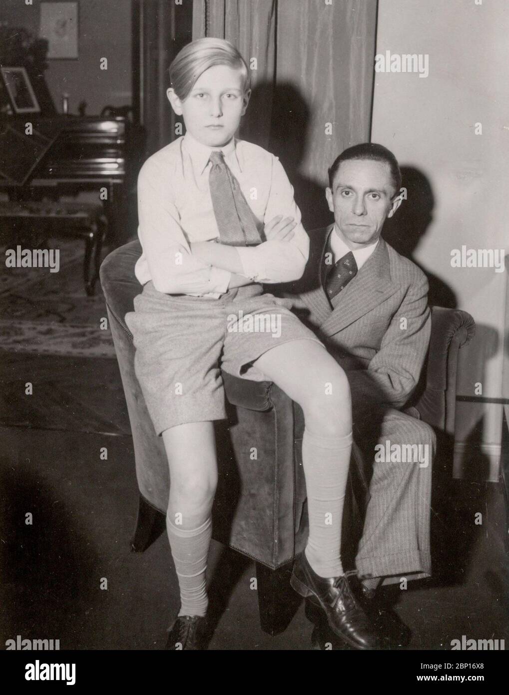 Joseph Goebbels, Heinrich Hoffmann Photographs 1933 Adolf Hitler's official photographer, and a Nazi politician and publisher, who was a member of Hitler's intimate circle.  Joseph Goebbels with his wife's son Harald Quandt  from her first marriage. Stock Photo
