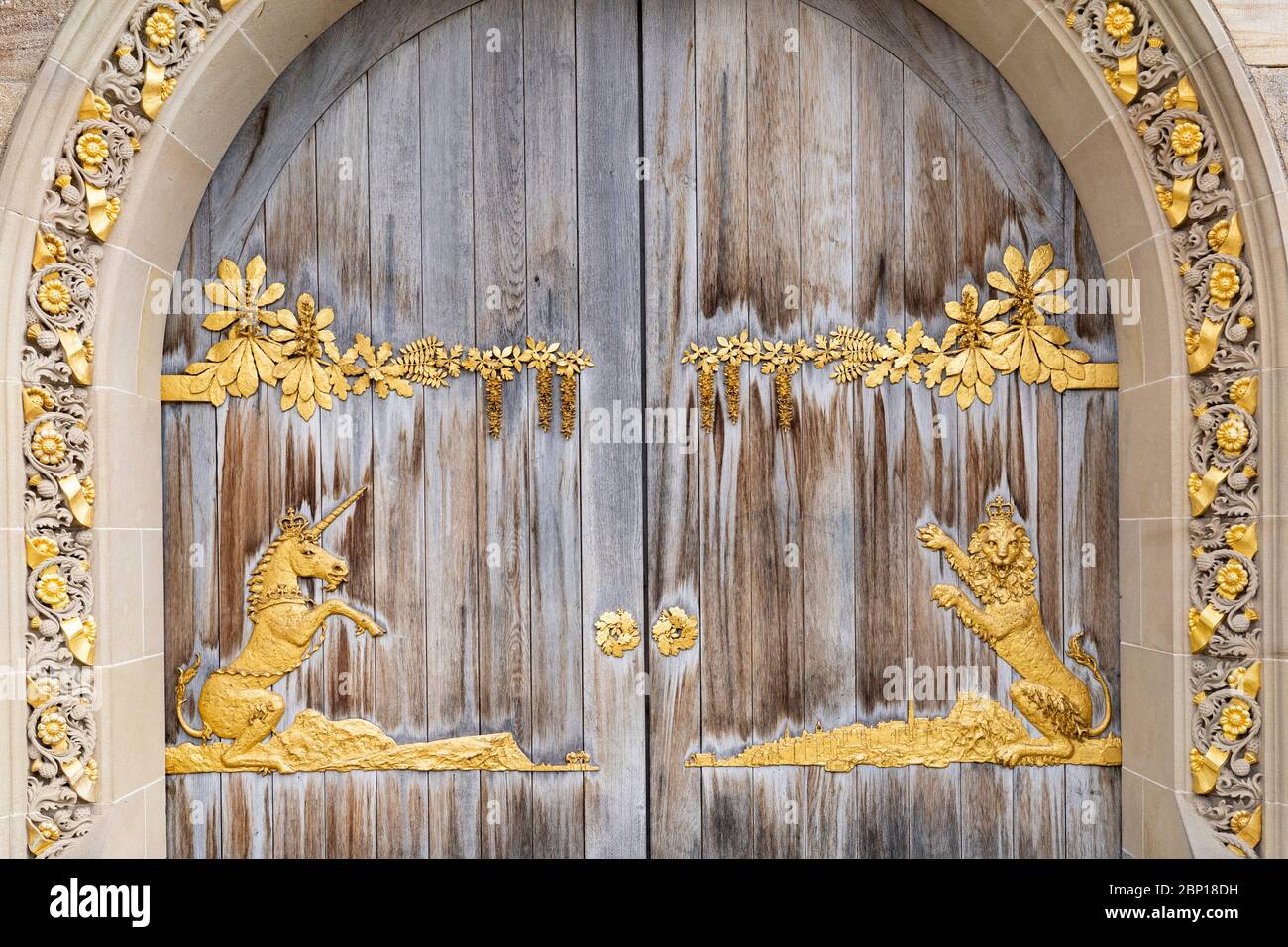 Ornate gilded decoration on wooden entrance doors at Queens Gallery at
