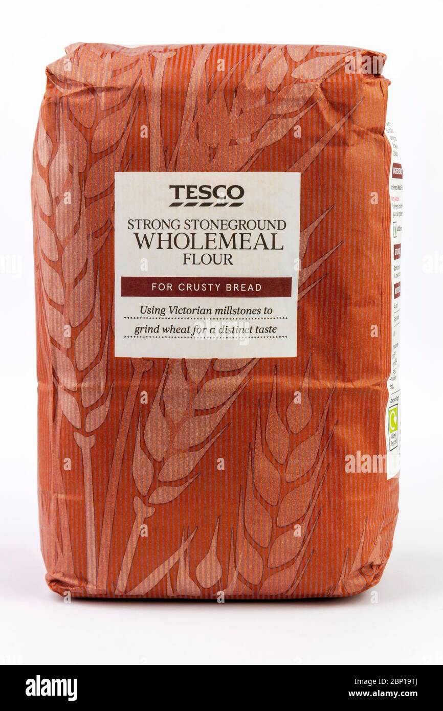Coventry, West Midlands, UK - May 13, 2020: Bag of Tesco home brand stone ground wholemeal flour unopened on an isolated white background Stock Photo