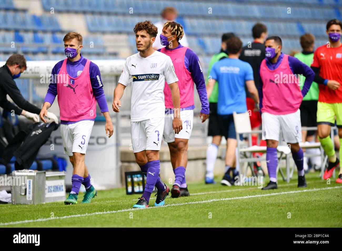 FILED - 17 May 2020, North Rhine-Westphalia, Bielefeld: Football, 2nd Bundesliga, DSC Arminia Bielefeld - VfL Osnabrück, 26th matchday, Schüco-Arena: Bashkim Ajdini (3rd from left) from Osnabrück leaves the pitch at half-time. After a 65-day corona break, the ball is rolling again in the Bundesliga. The matches take place without spectators. Photo: Stuart Franklin/Getty/POOL/dpa - IMPORTANT NOTE: In accordance with the regulations of the DFL Deutsche Fußball Liga and the DFB Deutscher Fußball-Bund, it is prohibited to exploit or have exploited in the stadium and/or from the game taken photogra Stock Photo