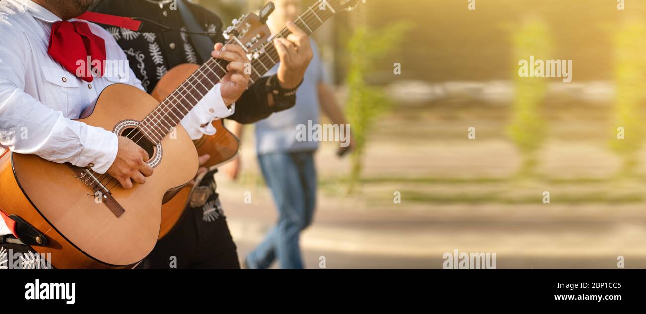 Mexican musician play guitar. Stock Photo