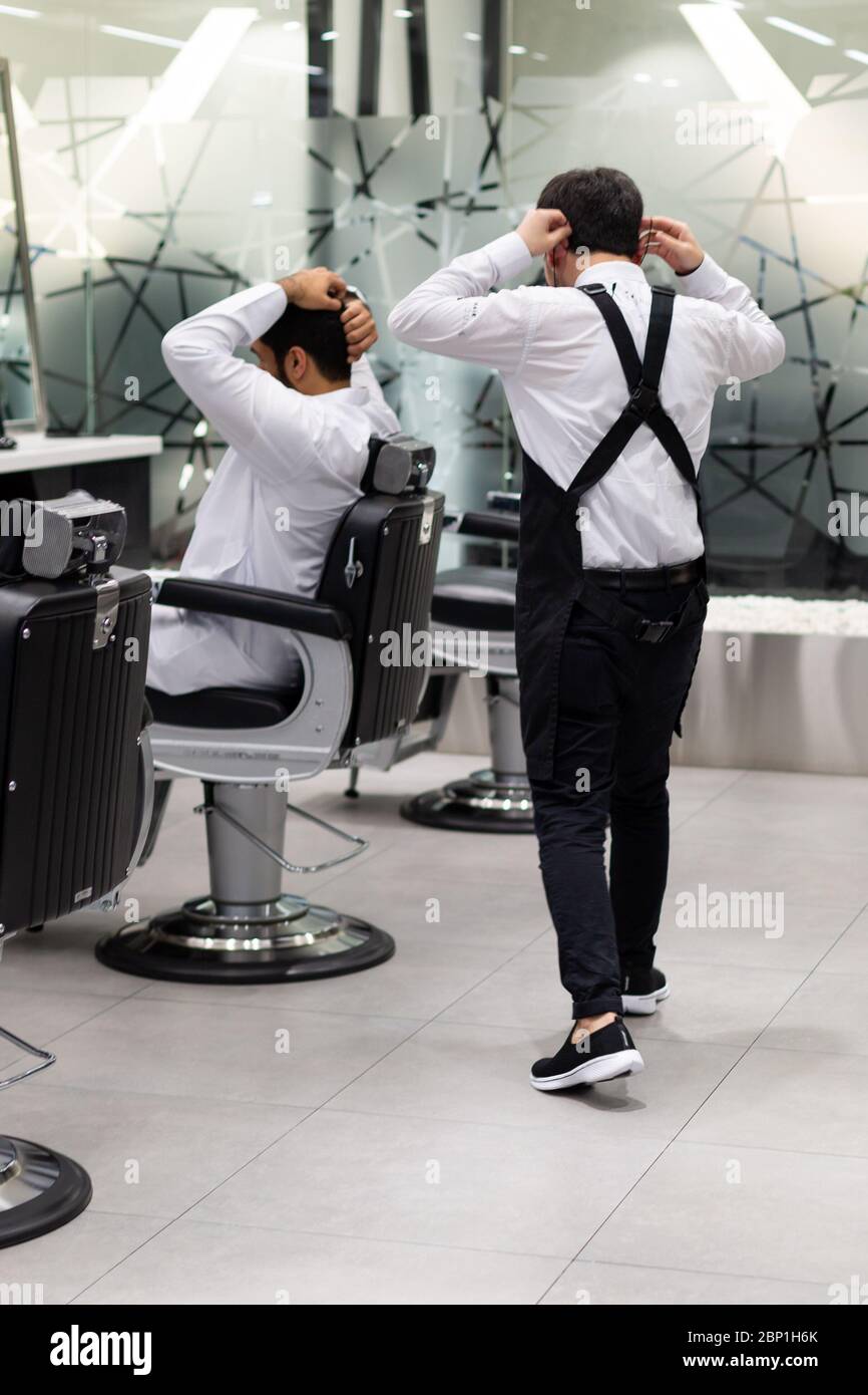 People at the hairdresser in Dubai Stock Photo Alamy