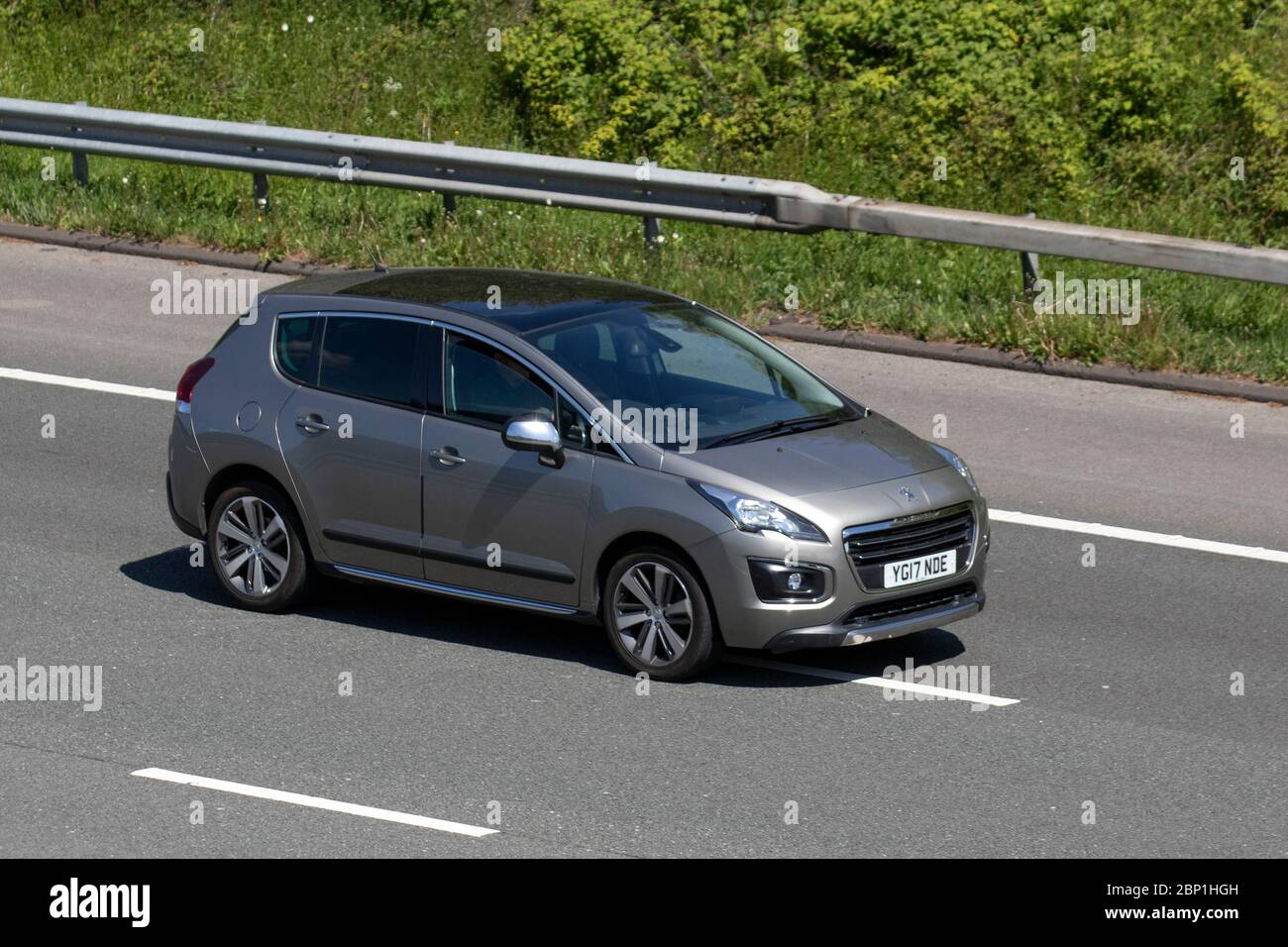 2017 grey Peugeot 3008 Allure Blue HDI S/S; Vehicular traffic moving vehicles, driving vehicle on UK roads, motors, motoring on the M6 motorway highway Stock Photo