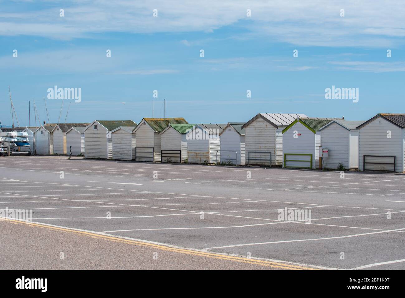 Lyme Regis, Dorset, UK. 17th May, 2020. UK Weather: A lovely warm and sunny Sunday afternoon at the seaside resort of Lyme Regis. Dorset Council operated car park at Monmouth Beach carpark remains firmly closed as visitors from outside the region are urged to 'stay away and visit later'. Credit: Celia McMahon/Alamy Live News Stock Photo