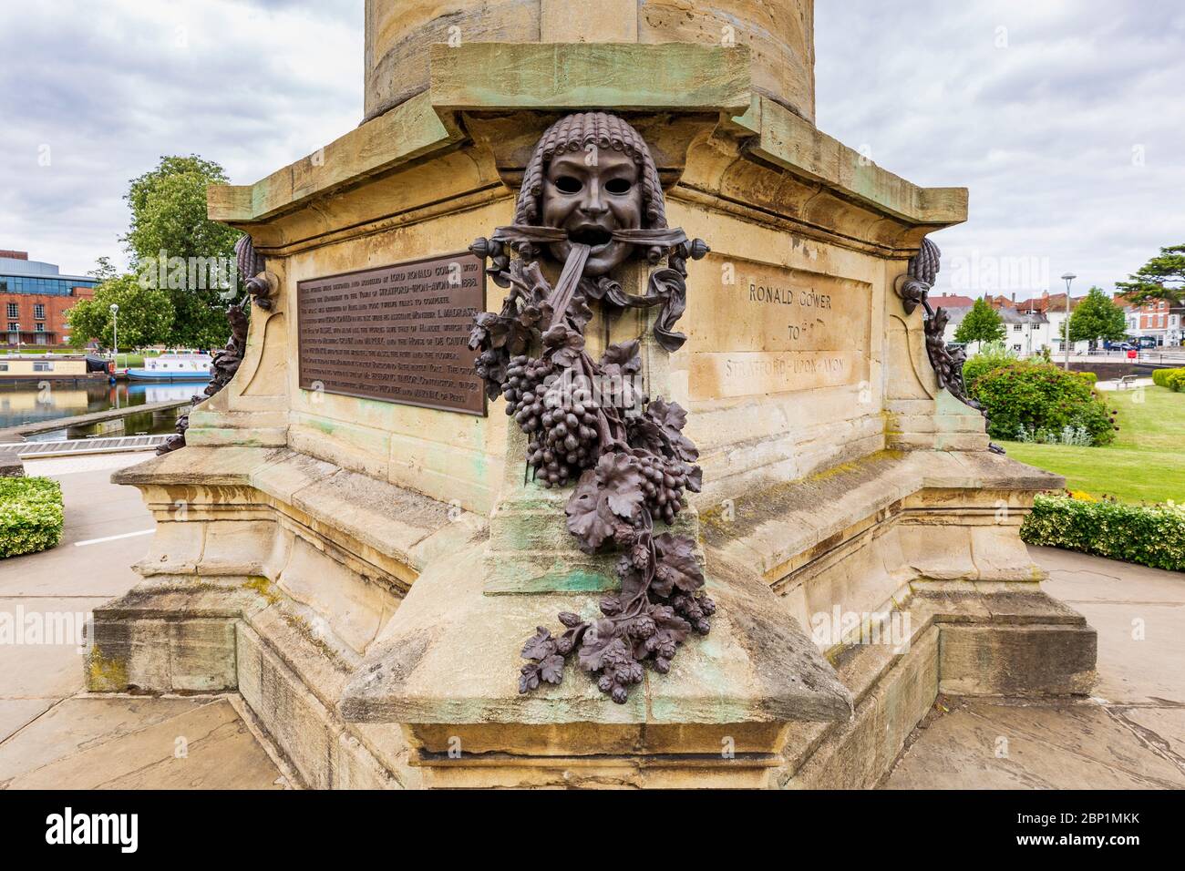 A Greek theatrical mask on the Gower Monument representing Comedy with hops and grapes, Stratford Upon Avon, England Stock Photo