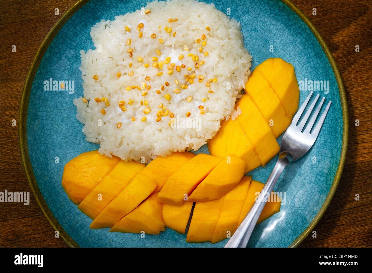 Thai Coconut sticky rice with mango with coconut sauce and roasted mung