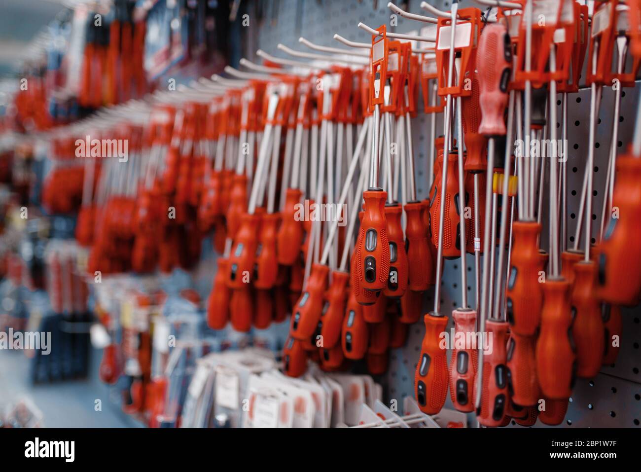 Screwdrivers on racks closeup, tool store, nobody Stock Photo