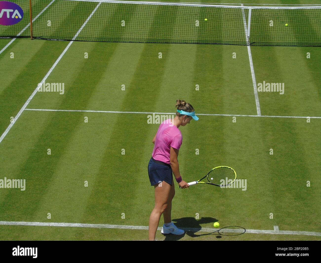 A professional women's tennis player at Nature Valley WTA in Birmingham, UK on the grass playing Stock Photo - Alamy