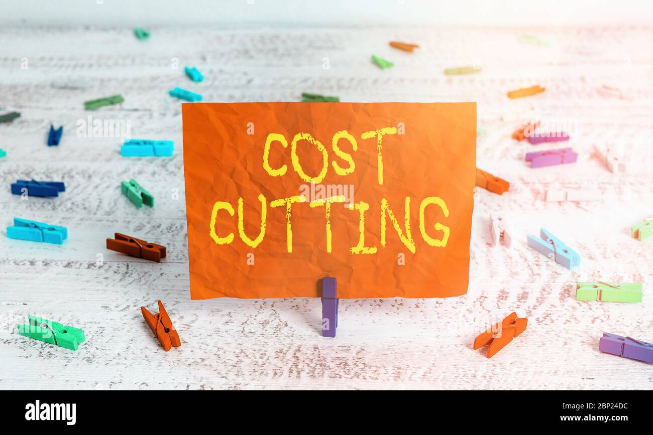 Writing note showing Cost Cutting. Business concept for Measures ...