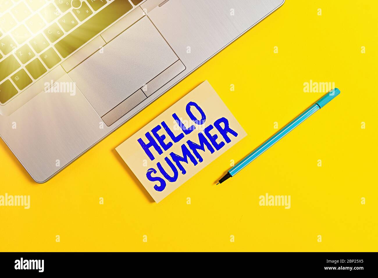 Handwriting text writing Hello Summer. Conceptual photo Welcoming the warmest season of the year comes after spring Trendy silver open laptop square s Stock Photo