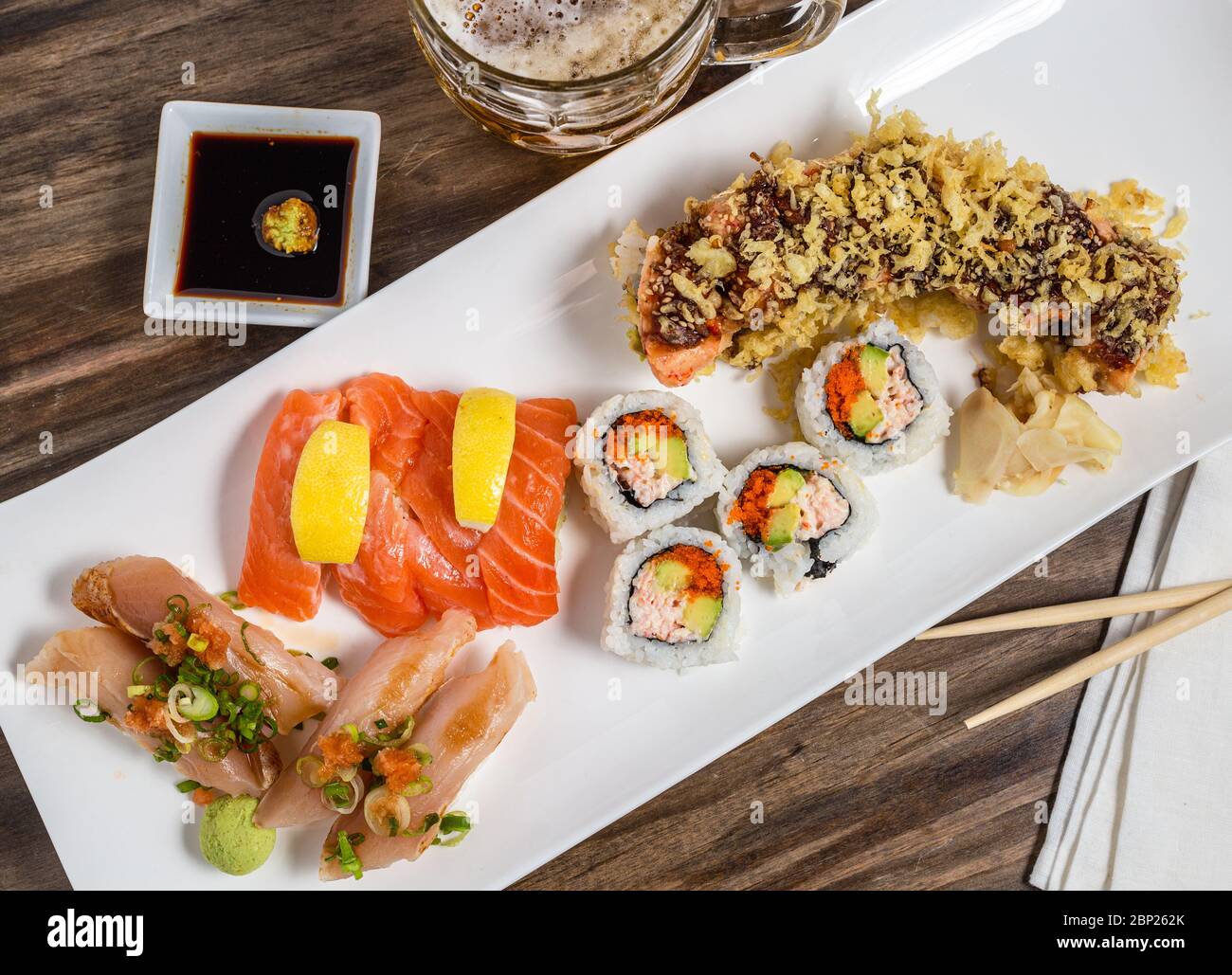 Sushi platter with tuna, salmon, crab roll and sushi roll meal with