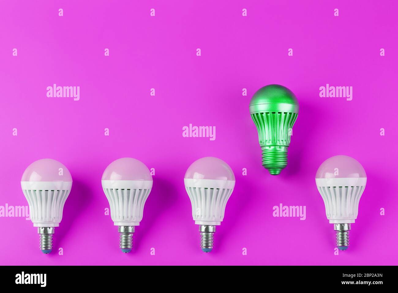 A special Light bulb stands out from the group of ordinary white light