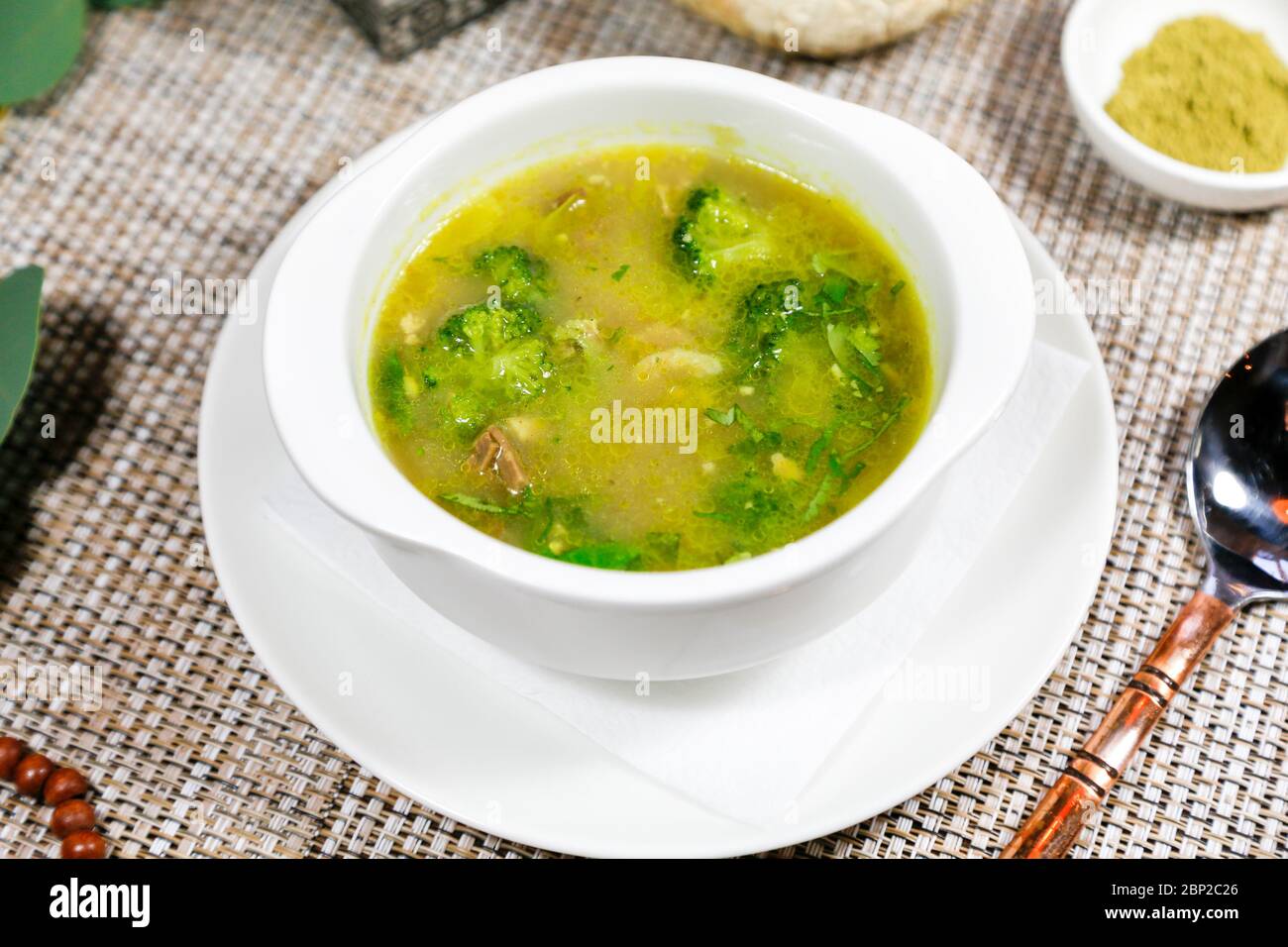Traditional Indian vegetable soup with herbs and spices on a served