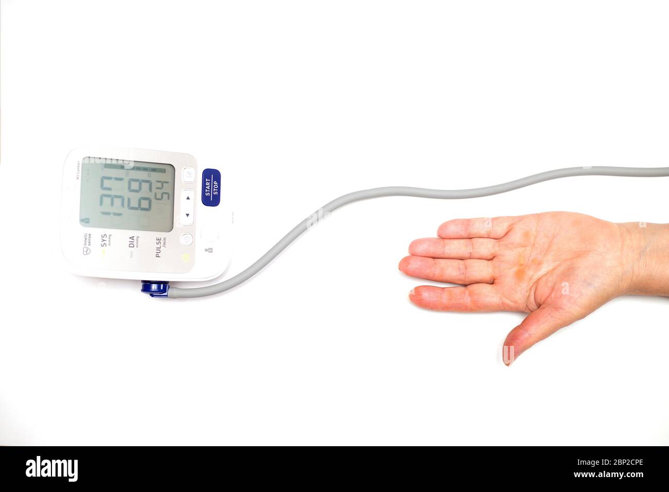 Image one woman checking her blood pressure . Stock Photo