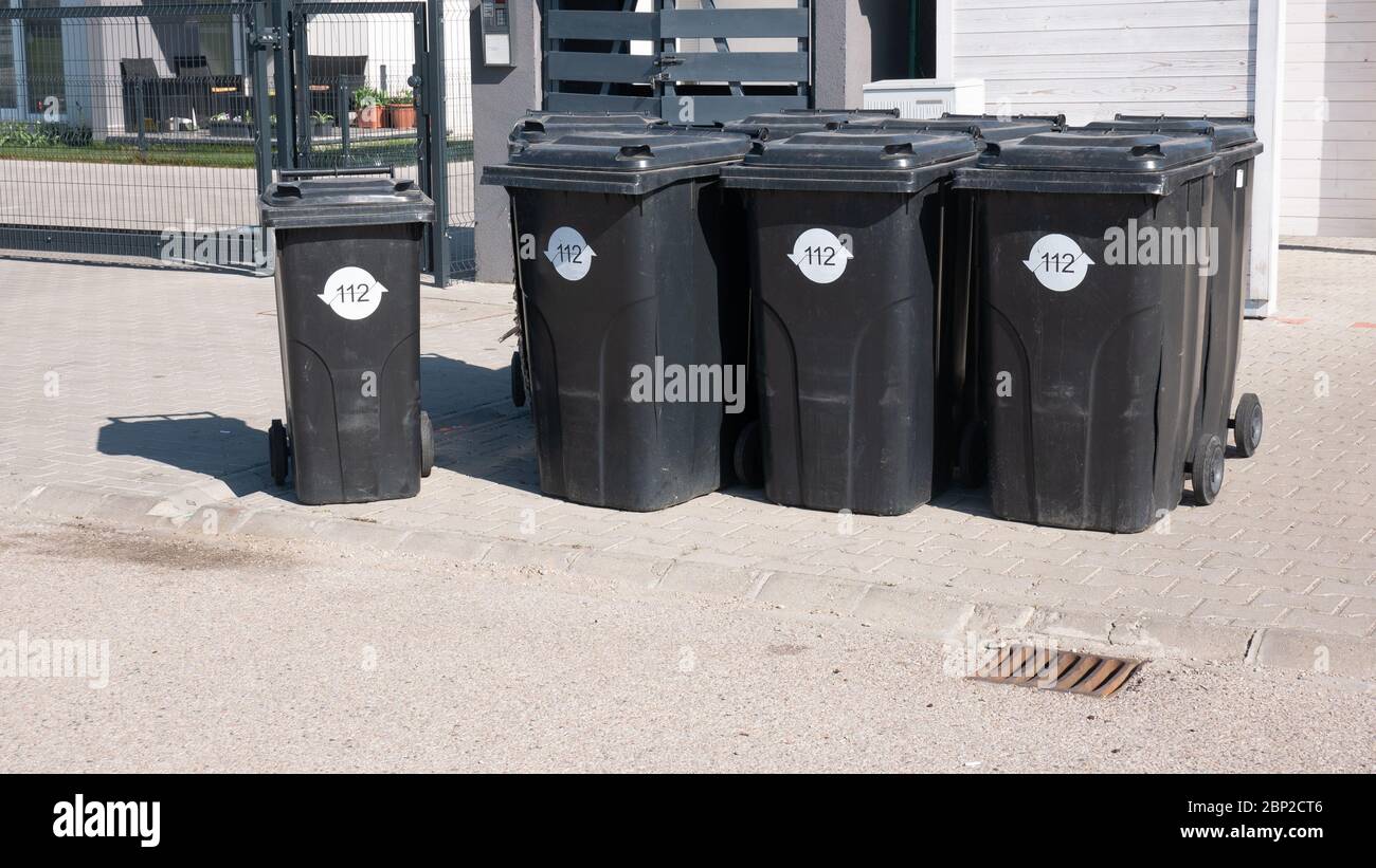 trash cans next to each other Stock Photo Alamy