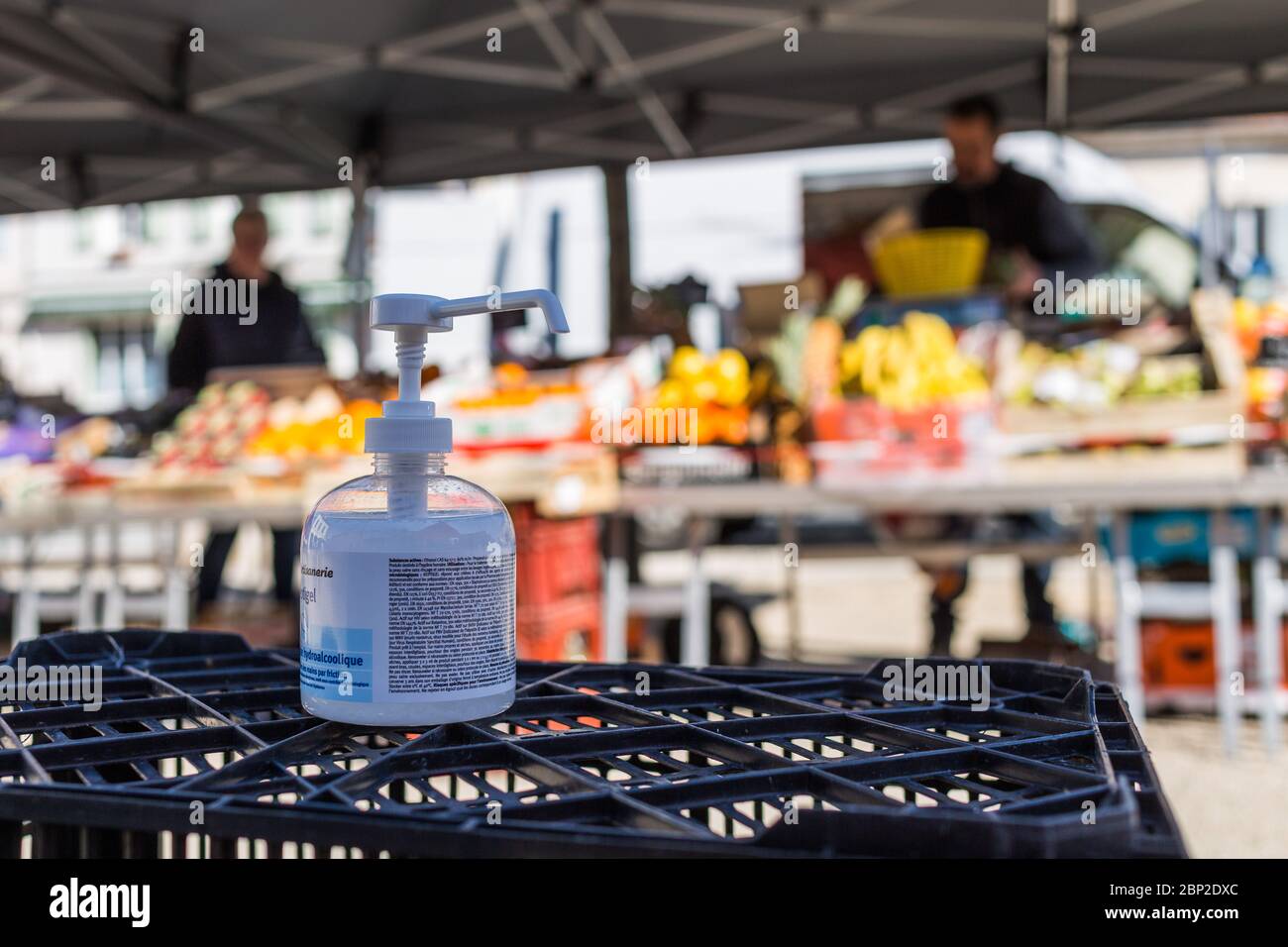 Local market authorized during the 2019-nCoV epidemic, hydroalcoholic gel made available at the market center, Dordogne, France. Stock Photo