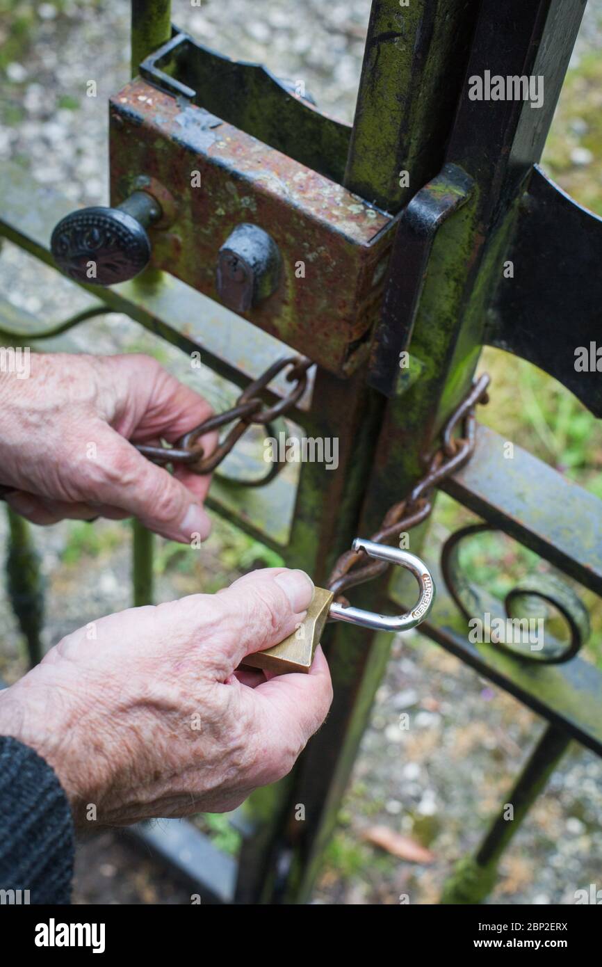 Person closing gate hires stock photography and images Alamy