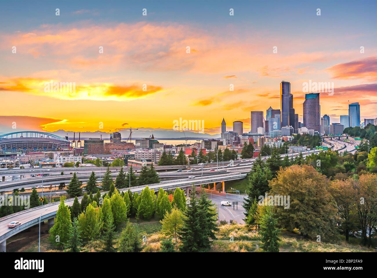 Seattle skylines and Interstate freeways converge with Elliott Bay