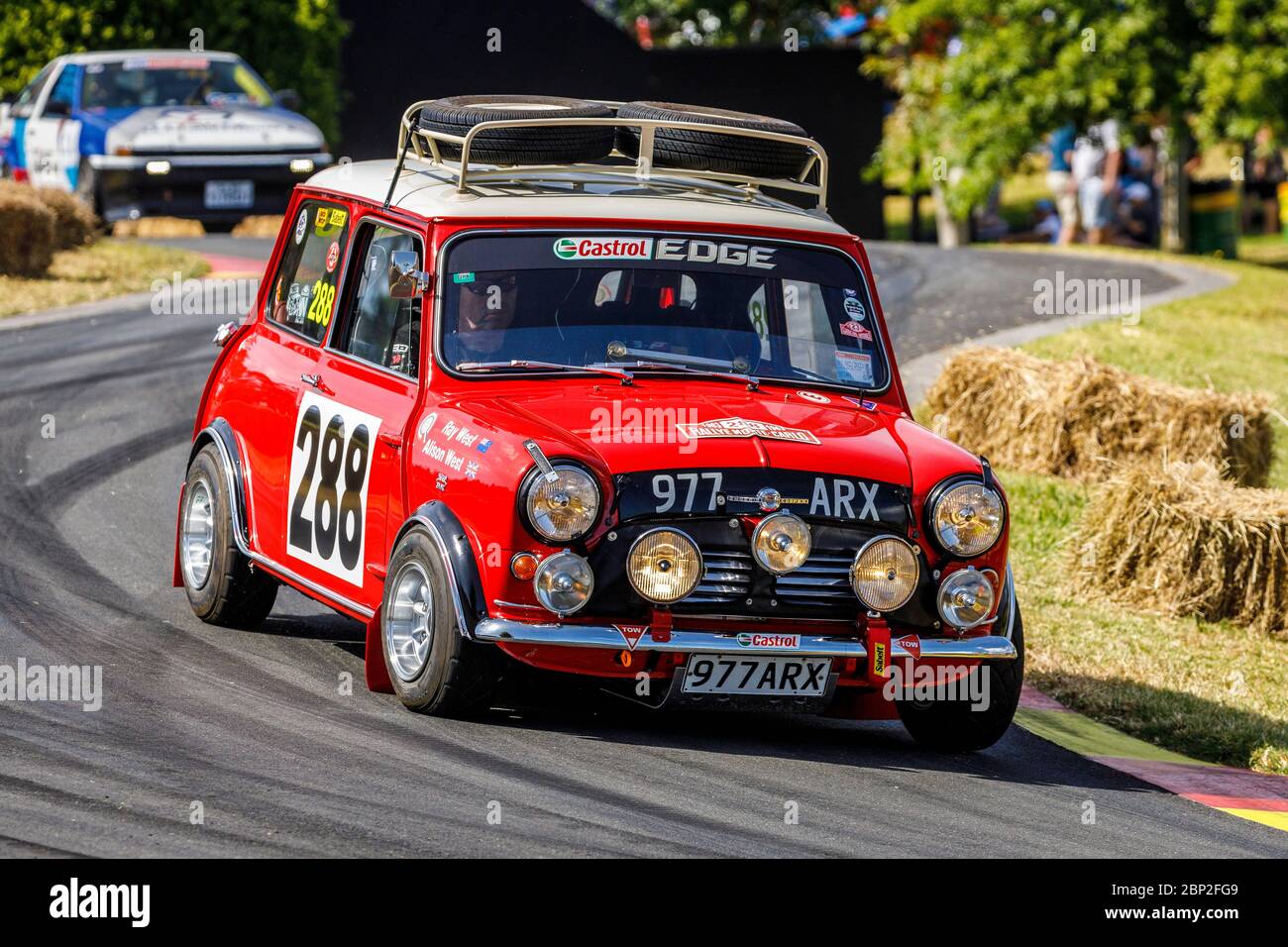 Ray West in his 1962 Morris Mini Cooper rally car. Fully updated and replica Monte Carlo Rally spec' interior. Stock Photo