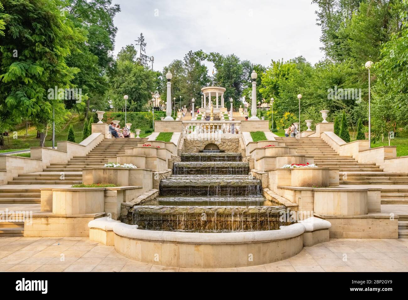Chisinau, Moldova - June 23, 2019: Fountains and the cascading stairs near the Valea Morilor Lake in Chisinau at summer, Moldova. Stock Photo