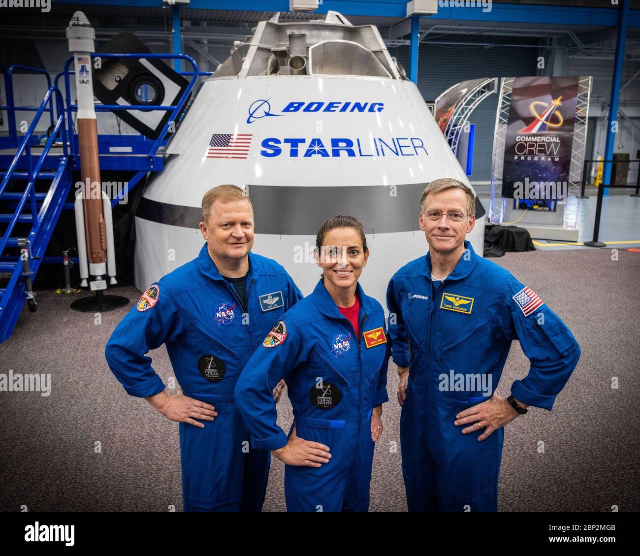 Commercial Crew Program (jsc2018e067950) From left NASA astronauts Eric Boe and Nicole Mann, along with Boeing astronaut Chris Ferguson, gathered in front of the Boeing Mockup Trainer at NASA’s Johnson Space Center in Houston, Texas on Aug. 2, 2018 ahead of the commercial crew flight assignments announcement Aug. 3. The three were assigned to launch aboard Boeing’s CST-100 Starliner on the company’s Crew Flight Test targeted for mid-2019 in partnership with NASA’s Commercial Crew Program. Stock Photo
